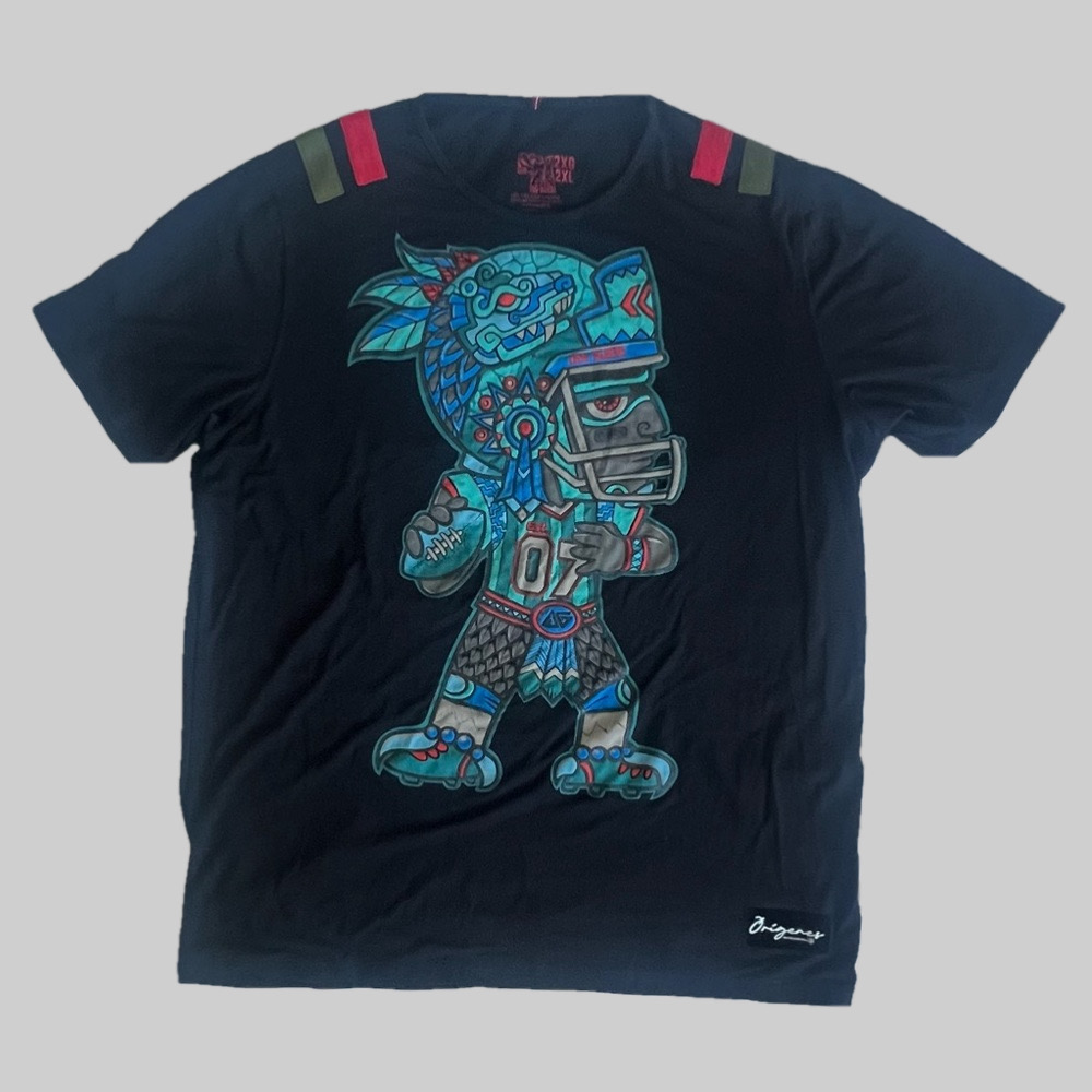 NFL Collections Mexico T-Shirt 
Orígenes Collećion de la NFL ‘Aye Guey’